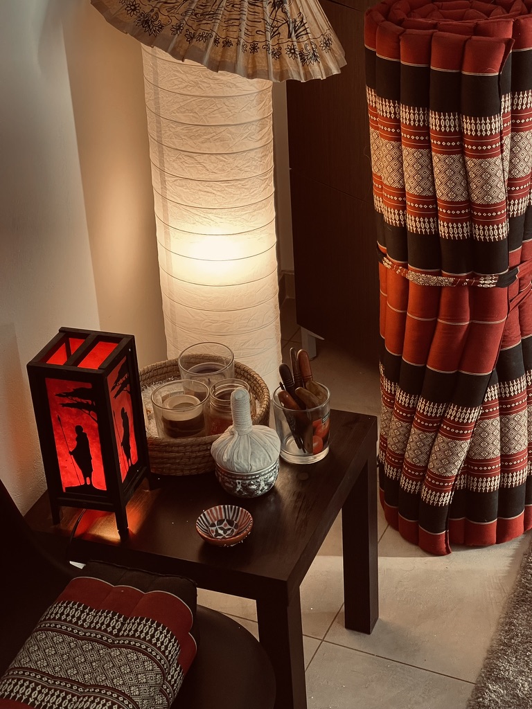 Tranquil massage spa treatment room Livadeia with warm ambient lighting
